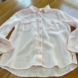 Chico’s pale pink button front blouse.  Size 2 (Medium).  Splits at hemline.